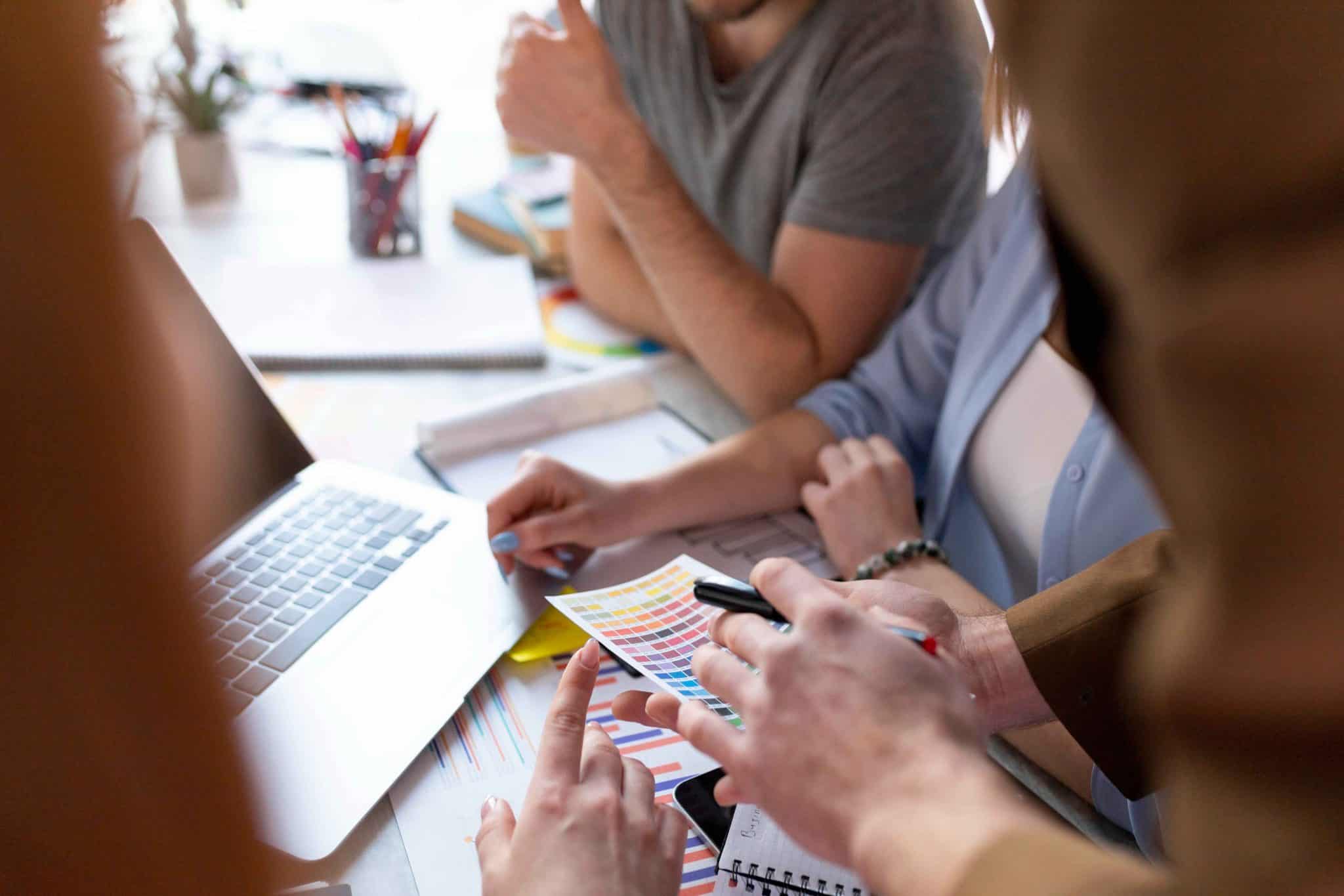 people brainstorming work meeting compressed scaled