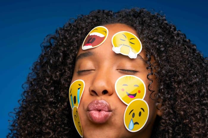 front view woman making kissy face compressed